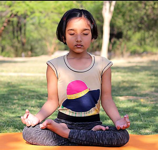 Kids yoga meditation outdoors